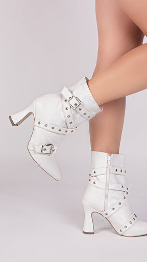 Mid-calf boot with buckle.